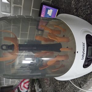 Baby Brezza Bottle Sterilizer in White and Orange